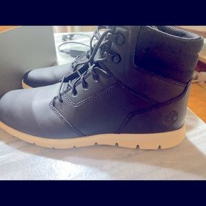 Men’s black Timberland sneaker boots. Never worn. Only tried on in store.